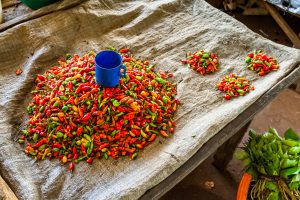 Fresh hot chilli peppers in a market of Sierra Leone