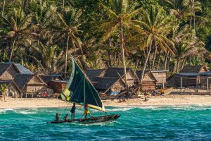Polynesian Style Outrigger Sailing in Deboyne Islands, Papua New Guinea