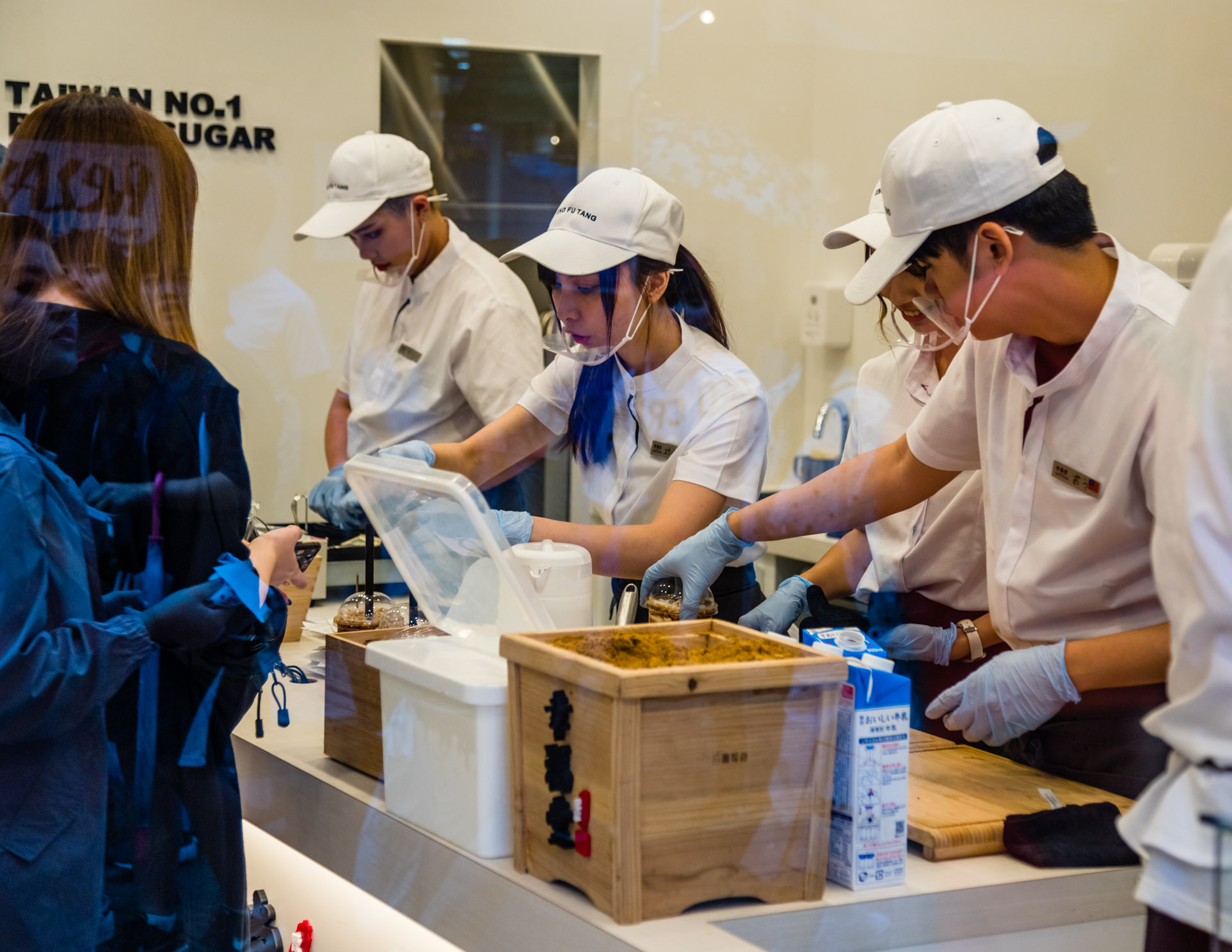 Manufactuers and sellers of Taiwanese Sweets wearing protective masks, Shibuya, Tokyo, Japan