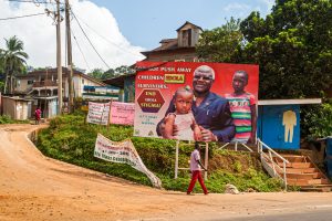 The President of Sierra Leone asks for respect for Ebola survivors on a billboard