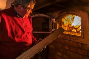 For master brewer Josef (Sepp) Neuber, the day begins with lighting up the two ovens in the old brewery. Traditional Zoigl Brewery in Falkenberg, Germany